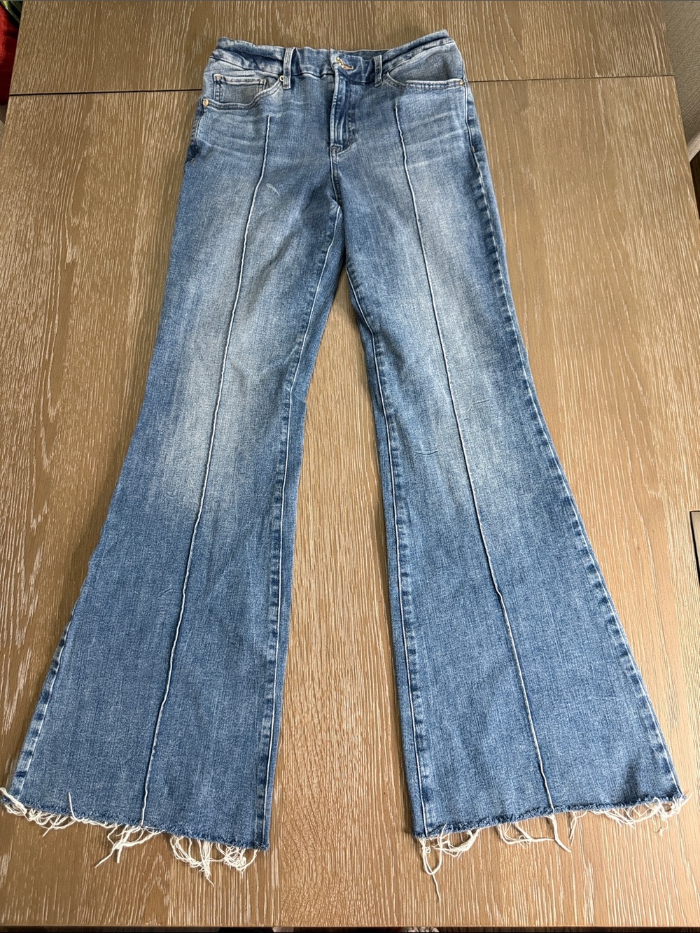 Express Light Blue Flared Jeans with Raw Hem